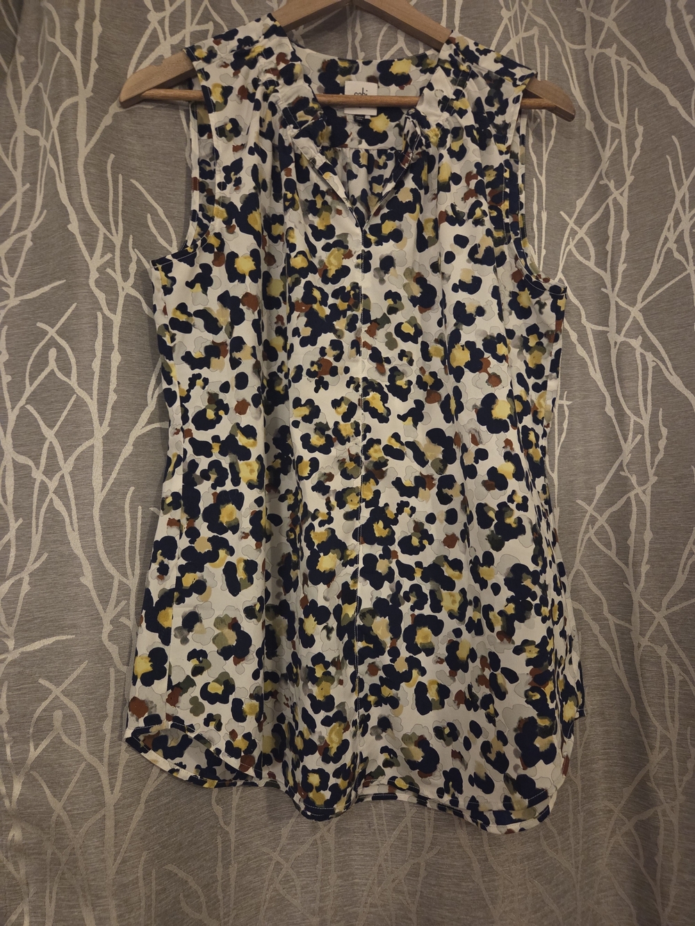 CAbi Sleeveless V-Neck Blouse in White with Navy, Yellow & Brown Spots. Size L